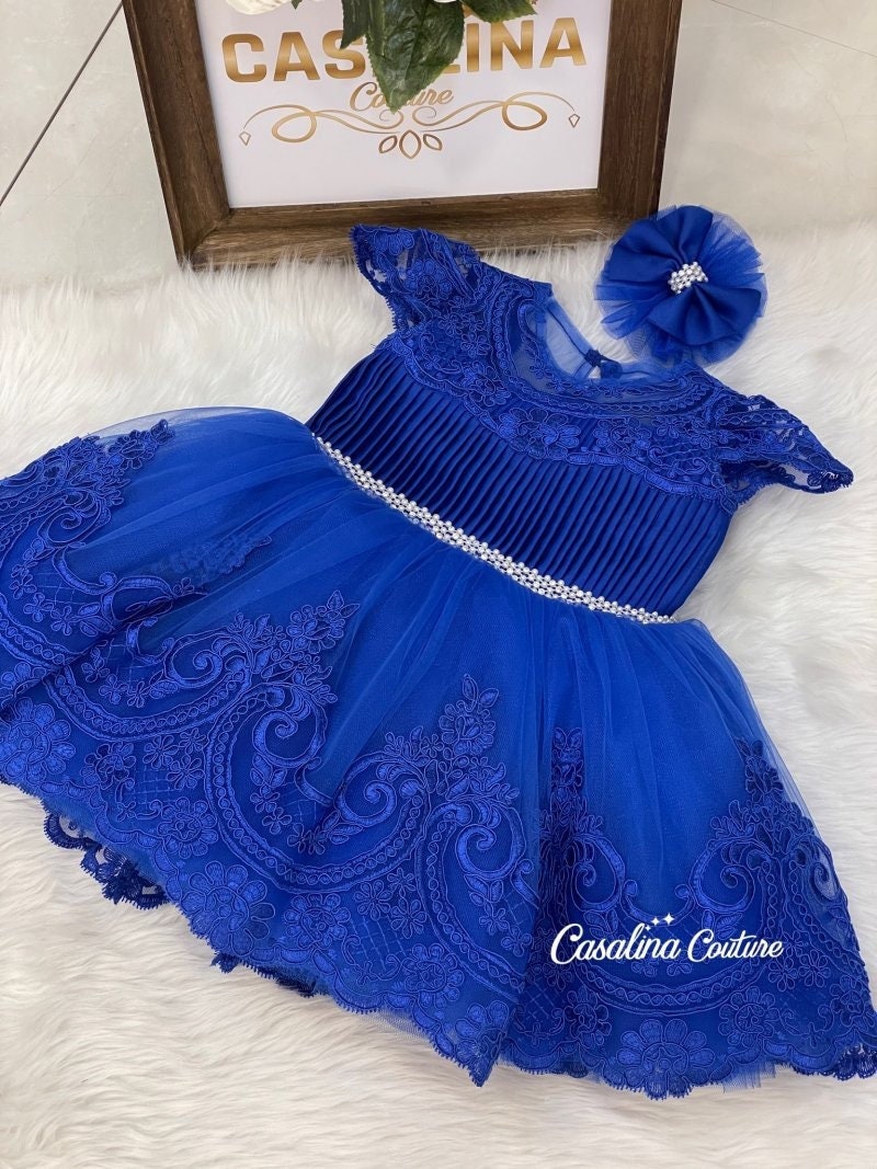 Melody Dress Royal Blue. Blue lace knee length baby girl dress. Royal blue puffy big bow flower girl birthday dress with jewel belt