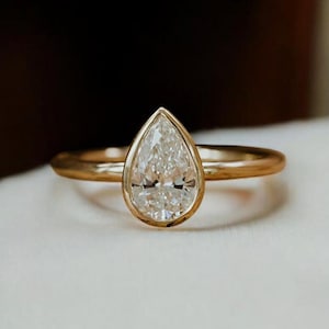 Pear Cut Moissanite Gold Ring: Bezel Set Minimalist Engagement Jewelry