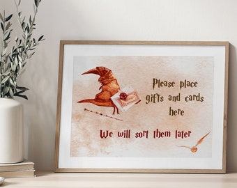 May include: A printable sign with a watercolor illustration of the Sorting Hat from Harry Potter. The text reads "Please place gifts and cards here. We will sort them later."