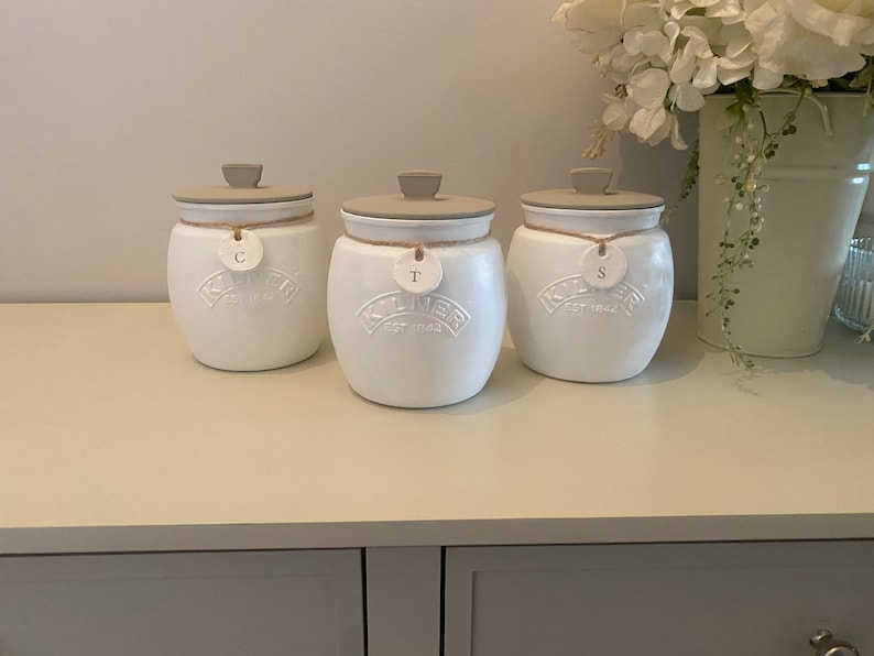 Glass Kitchen Canisters in White with Swing Tag Labelling Taupe Lids