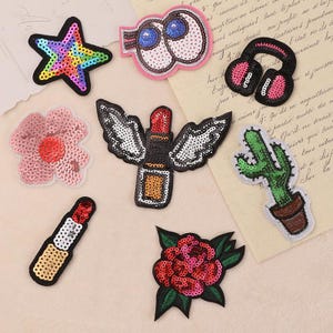Toppa con paillettes scintillanti, toppa con paillettes a forma di rossetto, toppa con stella colorata, toppa con cuffie, toppa con fiore, toppa con pianta in vaso e cactus, ecc., toppa stirabile