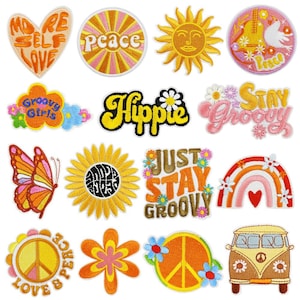 May include: A set of 15 colourful embroidered iron-on patches with a 1960s and 1970s hippie theme. The patches feature peace signs, flowers, butterflies, rainbows, suns, and text like "Peace", "Groovy", "Hippie", and "Just Stay Groovy".