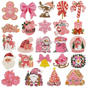 May include: A selection of pink and white Christmas-themed embroidered patches. Designs include a gingerbread man, bows, reindeer, candy canes, baubles, snowflakes, Santa Claus, snowmen, a Christmas tree, and a gingerbread house.