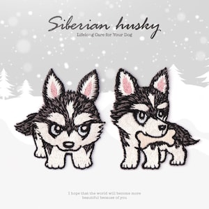 May include: Two embroidered iron-on patches of a cartoon Siberian husky puppy. One puppy is looking forward, the other is holding a bone in its mouth. Both patches have black, white, and pink details.