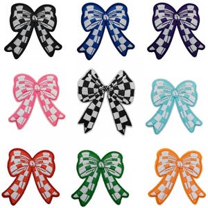 May include: Set of ten iron-on patches featuring checkered bow designs in various colors, including black, blue, pink, white, green, light blue, and orange.