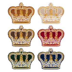 May include: Six crown-shaped patches arranged in two columns. Each patch features a velvet-like base in brown, beige, dark brown, red, dark green, or navy blue, decorated with gold sequins and white embroidered outlines in a regal pattern.