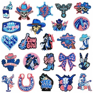 May include: A collection of twenty-four embroidered patches featuring western-themed designs including cowboy hats, boots, skulls, horses, cacti, guitars, horseshoes, and bows in shades of blue, pink, and white with various text elements.