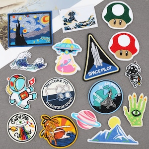Populaire patches 16 VERSCHILLENDE ontwerpen, geborduurde opstrijkpatch, badgepatch appliqué jeans tassen kleding transfer, astronaut wave luchtschip enz.