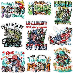 May include: A collection of nine embroidered patches featuring fishing themes, including fish illustrations, fishing rods, and text such as Daddy's Fishing Buddy, Fisher of Men, I'd Rather Be Fishing, Life Liberty and the Pursuit of Fish, and Reel Cool Dad.