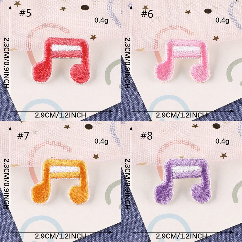 May include: Four embroidered iron-on patches in the shape of a musical note. The patches are red, pink, yellow, and purple. Each patch measures 2.3 cm by 2.9 cm.