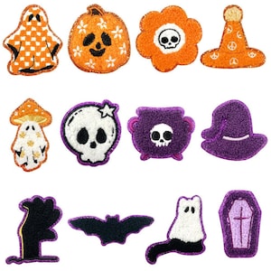 May include: Set of 12 Halloween iron-on patches featuring various spooky designs, including ghosts, pumpkins, skulls, bats, and a cauldron. The patches are made of felt and have a variety of colours, including orange, purple, black, and white.