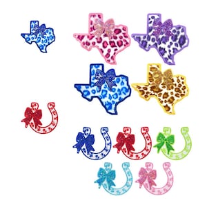 May include: A collection of embroidered patches featuring the shape of Texas and horseshoes. The Texas patches have leopard print patterns and bows. The horseshoe patches have bows in various colors, including red, blue, and green.