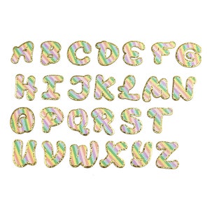 May include: A set of 26 colourful alphabet letters with a rainbow striped pattern and gold glitter trim. Each letter is individually cut out and ready to be used for crafting projects.