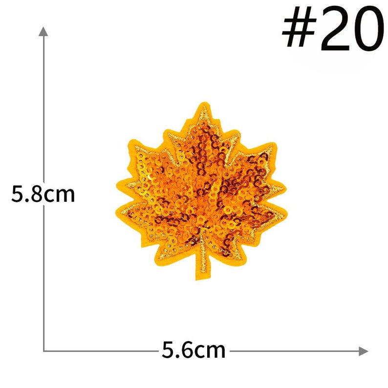 Pu&ograve; includere: Una toppa a forma di foglia d'acero ricoperta di paillettes arancioni con un bordo ricamato giallo. La toppa &egrave; contrassegnata con #20 e misura 5,8 cm in altezza e 5,6 cm in larghezza, come indicato dalle linee di misura nell'immagine.