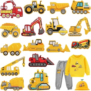 May include: A collection of embroidered patches featuring various construction vehicles in yellow and red. Includes a yellow sweatshirt, gray sweatpants, and a yellow hat with construction vehicle designs.