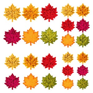 Pu&ograve; includere: Una collezione di toppe a forma di foglia d'acero ricoperte di paillettes scintillanti. Il set include vari colori come giallo brillante, arancione, rosso intenso, magenta e verde lime, disposti in uno schema a griglia su sfondo bianco.