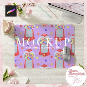 May include: A lavender mousepad featuring a repeating pattern of red gumball machines filled with colorful gumballs and heart shapes. The word "MOCKUP" is printed in white, with the text "See your art come to life!" below. A computer mouse is on the right.
