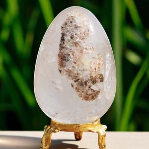 Uovo di quarzo bianco lucido: decorazione metafisica curativa (65 mm)