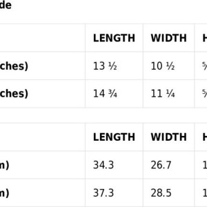 May include: Size guide for a product with measurements in inches and centimeters. The table shows the length, width, and height of the product in both inches and centimeters for two different sizes: 13 inches and 15 inches.