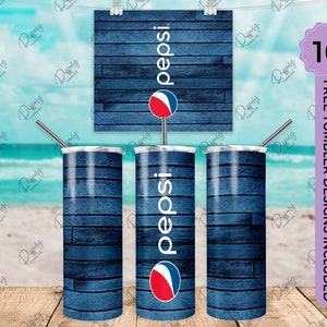 May include: Three stainless steel tumblers with a blue wood grain design and the Pepsi logo. The tumblers are on a white sandy beach with a blue ocean in the background. The image includes the text "FREE TUMBLER DESIGNS INCLUDED" and the number "10".