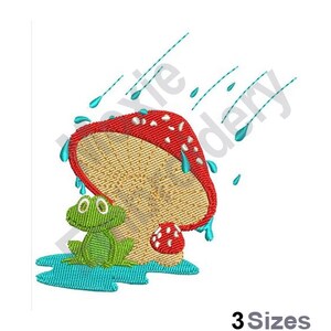 May include: A green frog sits under a red and white mushroom with white spots.  Rain falls from the sky in blue droplets.  The mushroom is tilted to the side, as if it is protecting the frog from the rain.