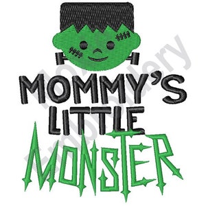 May include: Green and black embroidery design of a monster with the text "Mommy's Little Monster"