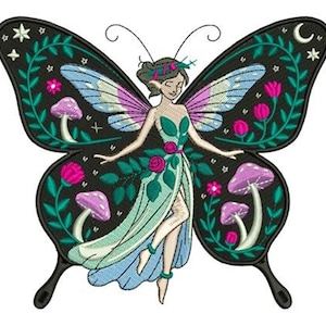 May include: Embroidered design featuring a fairy with butterfly wings. The wings are black with floral and star details, and the fairy wears a green dress. Pink mushrooms and roses are also included in the design.
