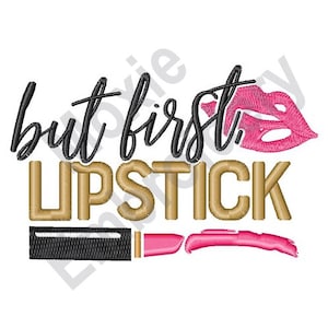 May include: Gold lettering reads "but first, lipstick" with a pink lipstick tube and pink lips.