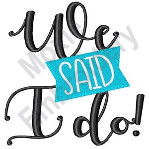 May include: Black and white calligraphy text that reads "We Said I Do!" with a blue banner that says "Said" in white text.