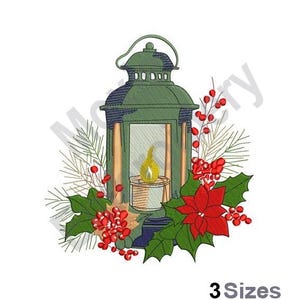 May include: A green lantern with a lit candle inside, surrounded by red poinsettia flowers and green holly leaves.