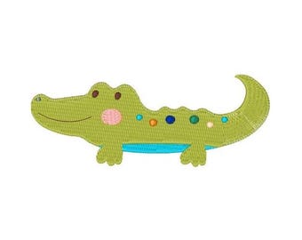 Diseño de bordado a máquina de cocodrilo de dibujos animados
