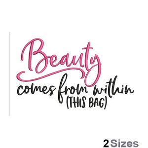 May include: Pink cursive text that reads "Beauty comes from within (this bag)" in black text.