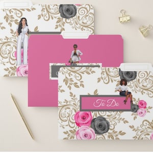 May include: Three pink and white file folders with a gold and black floral pattern. The folders have a label that says "To Do".
