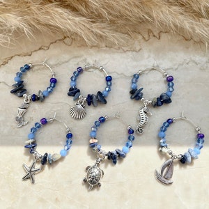 Set of 6 glass markers - silver & dark blue - maritime motifs, shell, starfish, turtle, seahorse, boat, mermaid
