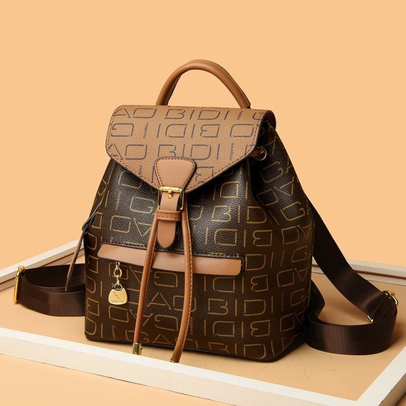 Backpack Luxury Designer By Louis Vuitton Size: Small