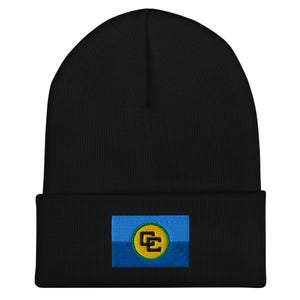 May include: Black beanie with an embroidered flag featuring the letters "GC" in a circle, in yellow and blue.