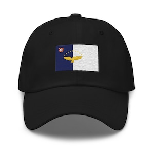 May include: A black baseball cap with an embroidered flag of the Azores. The flag features a blue and white background with a yellow bird and a small red shield.