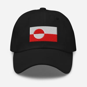 May include: A black baseball cap with an embroidered flag of Greenland. The flag is red, white, and has a red circle in the center.