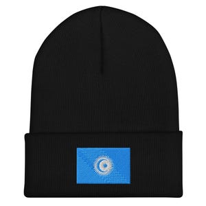 May include: Black beanie with a blue and white embroidered flag of Kazakhstan. The flag features a sun with a crescent moon and a five-pointed star.