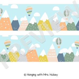 May include: A digital printable banner featuring a repeating pattern of colorful mountains with snow-capped peaks and hot air balloons against a light blue sky. The banner includes the text "Hanging with Mrs. Hulsely".
