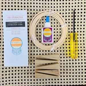 May include: A cane webbing kit for chair repair or restoration. The kit includes a roll of cane webbing, a bottle of glue, four wooden wedges, and a screwdriver. The kit is on a woven rattan surface.