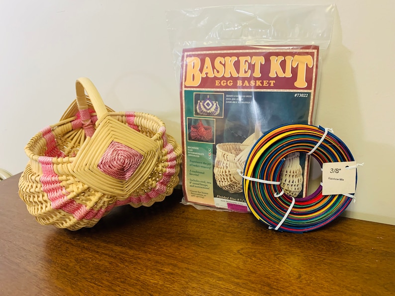 May include: A basket weaving kit with a finished egg basket, a package of rainbow colored reeds, and instructions. The kit includes 3/8 inch rainbow reeds.