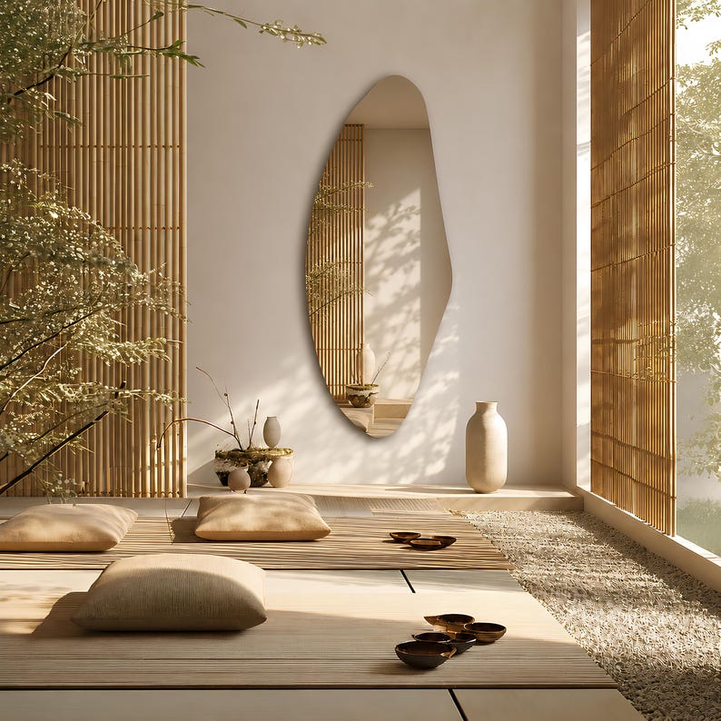 Large frameless geometric organic wall mirror featuring a tall sculptural silhouette with softly faceted contours and polished edges. Crafted from premium-quality mirror glass, it delivers a bright, natural reflection while adding artistic depth and visual interest to any space. Ideal for entryways, living rooms, bedrooms, dressing areas, and hallways. Its distinctive contemporary design complements modern, minimalist, Scandinavian, Japandi, and luxury interiors.