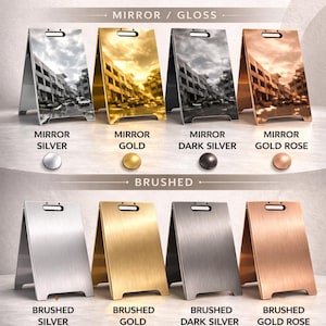 May include: An advertisement showcasing eight premium metal finishes for signs, including mirror and brushed options in silver, gold, dark silver, and gold rose. The text reads "Premium Metal Finishes" and "Custom sizes available."