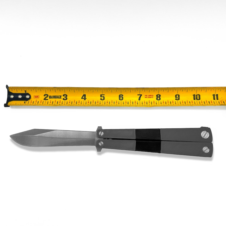 Size reference photo of open TF2 Spy Butterfly Knife replica alongside a measuring tape showing approximate length, Team Fortress 2 balisong cosplay prop dimensions