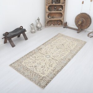 3x7 Vintage Turkish Rug: Faded Boho Anatolian Rug