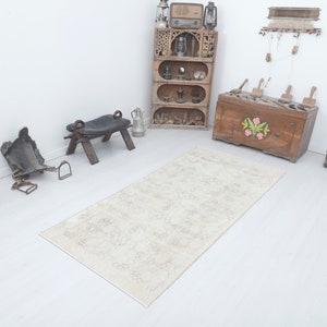 Faded Turkish Rug: 3x7 Vintage Anatolian Rug