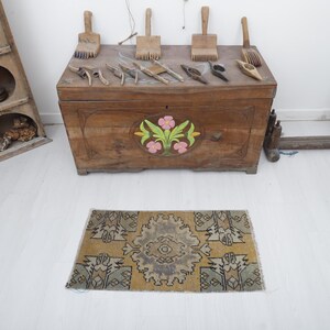 Vintage Turkish Wool Door Mat Rug: Small Anatolian Oushak Rug (1x3)