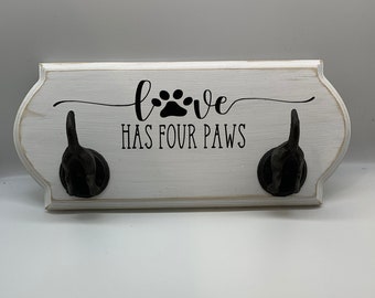 Dog tail leash holder