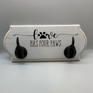 Dog tail leash holder